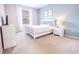 Guest bedroom with a queen bed and TV at 2774 Almaton Loop # 305, Kissimmee, FL 34747