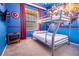 bedroom with bunk bed and superhero mural at 2774 Almaton Loop # 305, Kissimmee, FL 34747