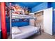 bedroom with bunk bed and superhero mural at 2774 Almaton Loop # 305, Kissimmee, FL 34747