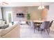 Bright dining area with round table and gray chairs at 2774 Almaton Loop # 305, Kissimmee, FL 34747