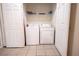 Small laundry room with washer and dryer at 2774 Almaton Loop # 305, Kissimmee, FL 34747