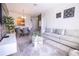 Open living and dining area with modern furniture and decor at 2774 Almaton Loop # 305, Kissimmee, FL 34747