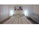 Serene bedroom with a cozy bed, soft lighting, and ample closet space at 2797 Bookmark Dr, Kissimmee, FL 34746