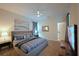 Cozy bedroom with a plush bed, soft lighting, and decorative accents at 2797 Bookmark Dr, Kissimmee, FL 34746