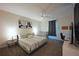 Stylish bedroom with a crib, desk area, and sleek design at 2797 Bookmark Dr, Kissimmee, FL 34746