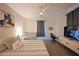 Well-lit bedroom with a comfortable bed, a crib, and modern furnishings at 2797 Bookmark Dr, Kissimmee, FL 34746