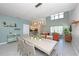 Open concept dining area that flows into the kitchen and living room at 2797 Bookmark Dr, Kissimmee, FL 34746