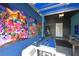 Recreation room featuring gaming chairs, pool table, and colorful, fun artwork at 2797 Bookmark Dr, Kissimmee, FL 34746