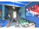 Game room offering fun with foosball, blue gaming chairs, and entertainment area at 2797 Bookmark Dr, Kissimmee, FL 34746