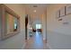 Hallway view into living areas showcasing modern design and spacious layout at 2797 Bookmark Dr, Kissimmee, FL 34746
