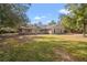 Brick ranch house with a large grassy yard at 2880 Old Canoe Creek Rd, St Cloud, FL 34772