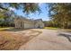 Detached brick garage with long driveway at 2880 Old Canoe Creek Rd, St Cloud, FL 34772