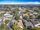 Community overview featuring lake and numerous homes at 301 Anastasia Dr, Kissimmee, FL 34759