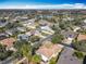 Community overview featuring lake and numerous homes at 301 Anastasia Dr, Kissimmee, FL 34759