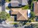 Top-down view of house showcasing roofline and landscaping at 301 Anastasia Dr, Kissimmee, FL 34759