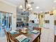 Bright kitchen features a breakfast nook, ample cabinetry, and views into the Gathering room at 301 Anastasia Dr, Kissimmee, FL 34759