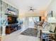 Relaxing living room with comfy seating and sliding doors at 301 Anastasia Dr, Kissimmee, FL 34759