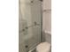 Clean bathroom with glass shower and tile floor at 3036 Parkway Blvd # 106, Kissimmee, FL 34747