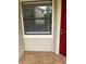 Condo exterior with tiled patio and door at 3036 Parkway Blvd # 106, Kissimmee, FL 34747