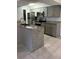 Updated kitchen with granite and stainless steel at 3036 Parkway Blvd # 106, Kissimmee, FL 34747