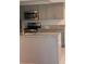 Modern kitchen with stainless steel appliances at 3036 Parkway Blvd # 106, Kissimmee, FL 34747