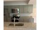 Modern kitchen with granite counters at 3036 Parkway Blvd # 106, Kissimmee, FL 34747