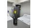 Bright laundry room, washer, dryer hookups, and shelving at 3036 Parkway Blvd # 106, Kissimmee, FL 34747