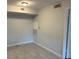 Empty spare bedroom with tile floor and closet at 3036 Parkway Blvd # 106, Kissimmee, FL 34747