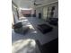 Spacious covered patio with plenty of seating area for outdoor entertaining at 372 La Paz Dr, Kissimmee, FL 34743