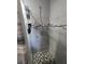 Modern shower with tiled walls and a shower head provides a spa-like experience at 372 La Paz Dr, Kissimmee, FL 34743