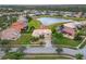 Two-story house with a large backyard and a lake view at 4010 Navigator Way, Kissimmee, FL 34746