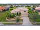 Two-story house with a large backyard and a lake view at 4010 Navigator Way, Kissimmee, FL 34746