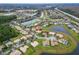 Two-story house situated in a neighborhood near a lake at 4010 Navigator Way, Kissimmee, FL 34746