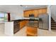 Kitchen with stainless steel appliances and granite countertop at 4010 Navigator Way, Kissimmee, FL 34746