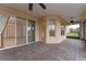 Spacious screened porch with paver tile floor and access to backyard at 4010 Navigator Way, Kissimmee, FL 34746