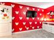 Mickey Mouse themed bedroom with bunk beds, TV, and ample storage at 4349 Quote St, Kissimmee, FL 34746