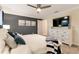 Bright bedroom with a comfortable bed and ample closet space at 4349 Quote St, Kissimmee, FL 34746