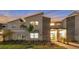 Modern two-story townhome with lighted entryway and landscaped grounds at 4349 Quote St, Kissimmee, FL 34746