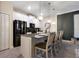 Sleek kitchen featuring stainless steel appliances and a large kitchen island at 4349 Quote St, Kissimmee, FL 34746
