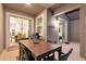 Outdoor patio with dining table, chairs, and access to the interior at 4349 Quote St, Kissimmee, FL 34746