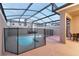 Private screened pool with safety fence and patio access at 4349 Quote St, Kissimmee, FL 34746