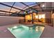 Private screened pool with safety fence and patio access at 4349 Quote St, Kissimmee, FL 34746