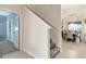 Modern staircase with light colored walls and carpet at 4349 Quote St, Kissimmee, FL 34746