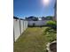 Private backyard with a white vinyl fence at 4447 Maple Chase Trl, Kissimmee, FL 34758