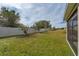Large backyard with fenced perimeter and well-maintained lawn at 4483 Casablanca Ave, Kissimmee, FL 34746
