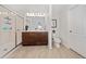 Bathroom with double vanity, shower, and toilet at 4483 Casablanca Ave, Kissimmee, FL 34746