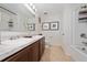 Bathroom with double vanity and bathtub at 4483 Casablanca Ave, Kissimmee, FL 34746