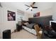 Bedroom with a bed, desk, and anime posters at 4483 Casablanca Ave, Kissimmee, FL 34746