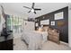Bedroom with a bed, TV, and decorative wall at 4483 Casablanca Ave, Kissimmee, FL 34746