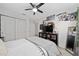 Bedroom with a bed, TV, and closet at 4483 Casablanca Ave, Kissimmee, FL 34746